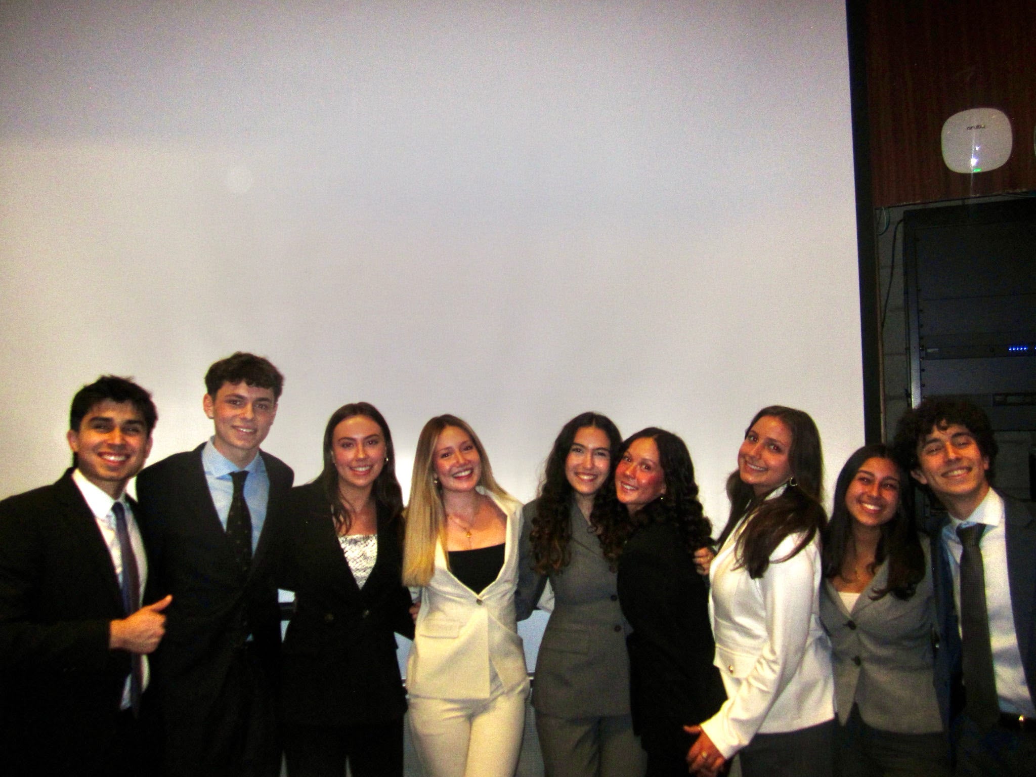 La Sociedad Latina members gathered together at a formal event